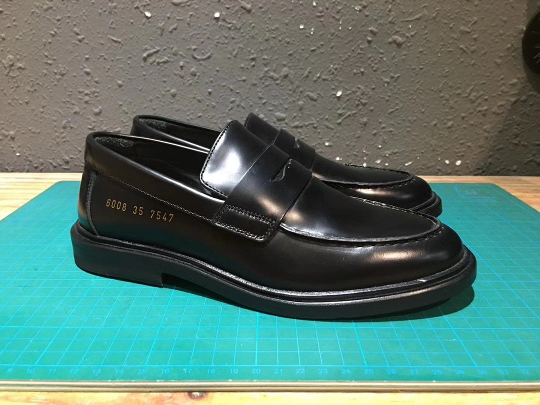 Common Projects Women's Leather Loafer in Black, 6008-7547: black leather loafer pair