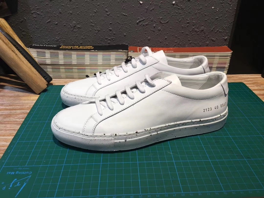 Common Projects Achilles Low with a Speckled Sole, Archive Set 0945: white achilles low with speckled sole