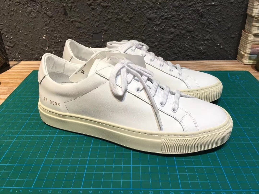 Common Projects Women's Retro Low in White, 3839-0506: white retro low pair